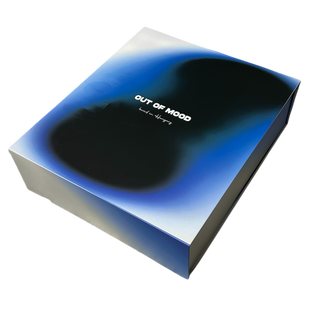 Blue and white product packaging with 'out of mood' branding on a white background